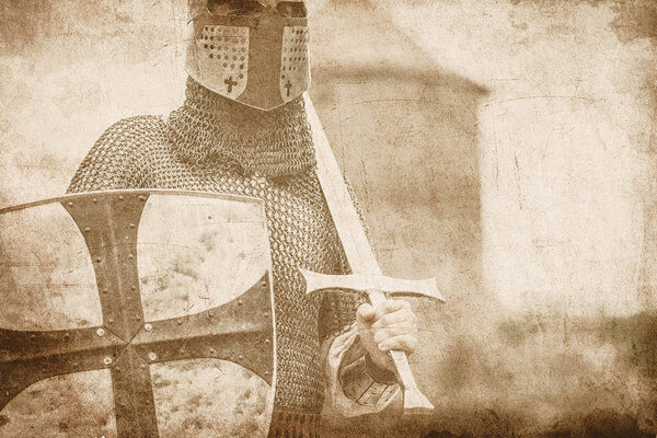 Medieval armed knight with sword and shield. Image in old color style