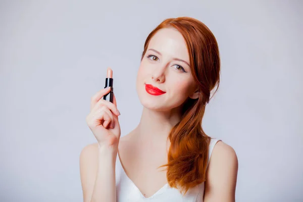 Young Redhead Girl Holding Lipstick Grey Background — Stock Photo, Image