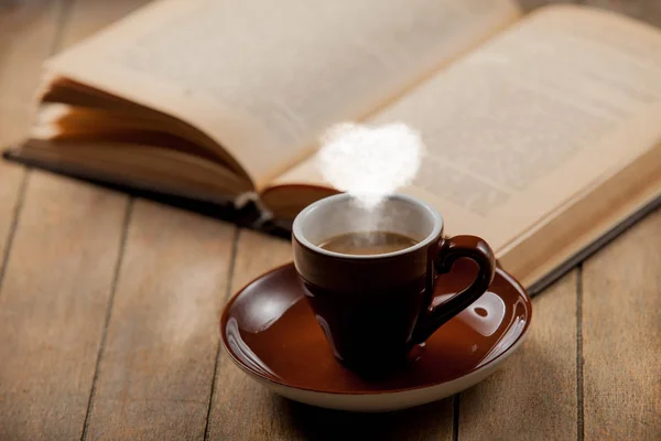 Brown Cup Coffee Heart Shape Steam Open Book Wooden Table — Stock Photo, Image