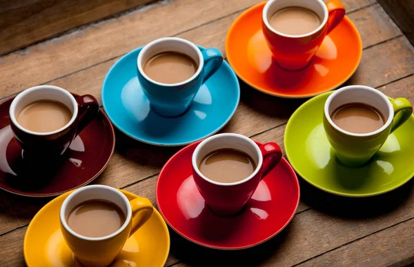 Seis Coloridas Tazas Café Sobre Fondo Madera —  Fotos de Stock