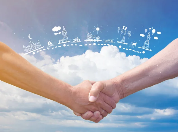 Strong handshake on blue sky — Stock Photo, Image