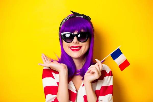 Girl with purple hair holding french flag — Stock Photo, Image