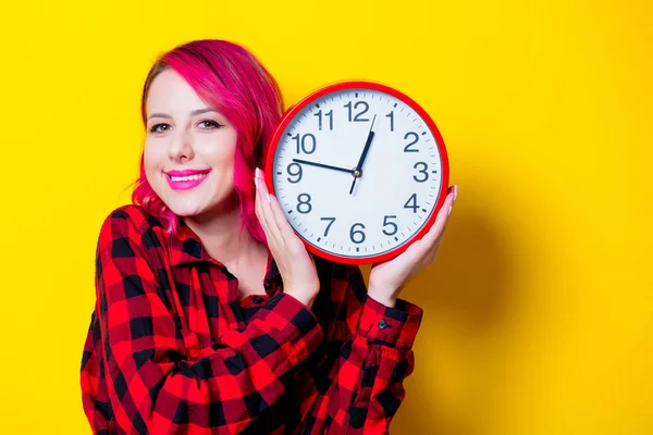 Young Redhead Girl Big Clock Portrait Isolated Yellow Background — Stock Photo, Image