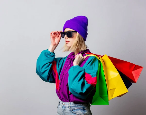 Style woman in 90s punk clothes with shopping bags — Stock Photo, Image