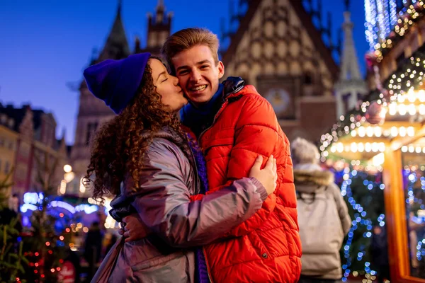 Young couple on Christmas market in Wroclaw, Poland — Stock Photo, Image