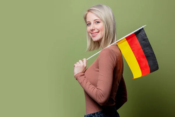 Beautiful blonde woman with flag of Germany — Stock Photo, Image