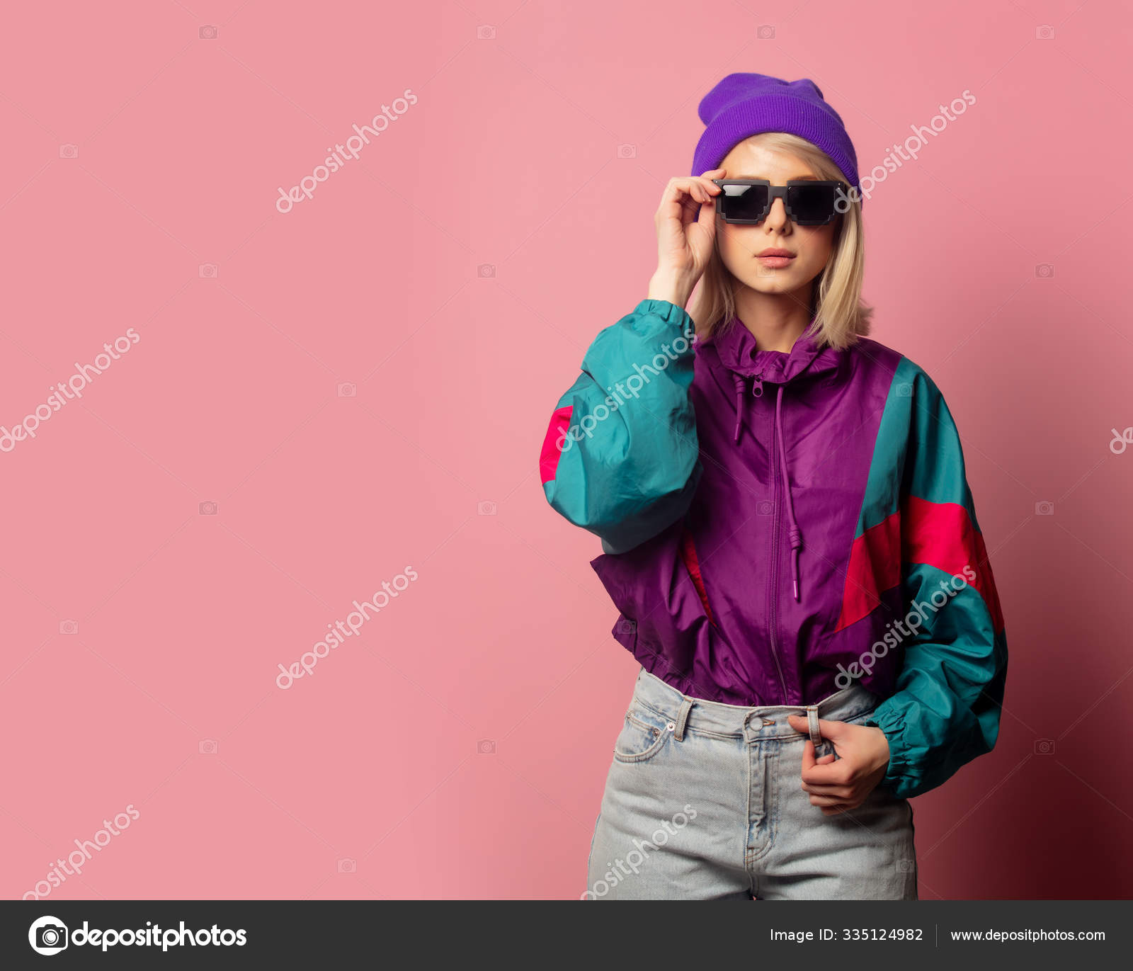 Beautiful blonde woman in sunglasses and 90s clothes Stock Photo by © massonforstock 335124982