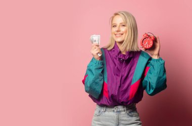 woman in 90s clothes with alarm clock and cash