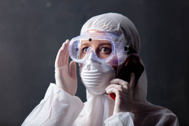 medic woman wearing protective clothing against the virus is usi clipart