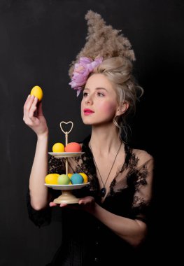 Beautiful blonde countess with an Easter eggs  clipart