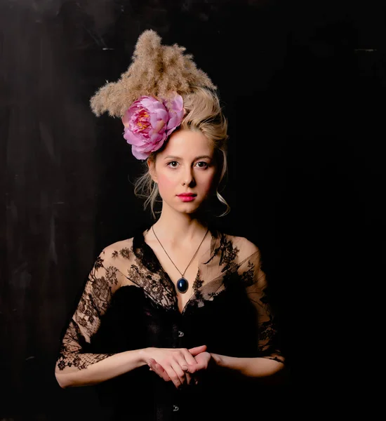 Beautiful blonde countess with vintage hairstyle and corset — ストック写真