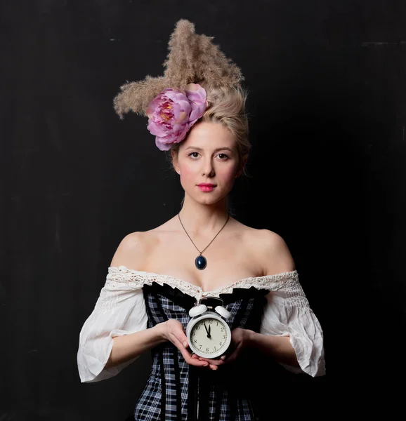 Beautiful blonde countess with alarm clock — ストック写真