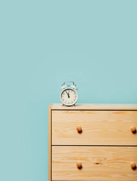 Vintage alarm clock on  bedside table — 스톡 사진