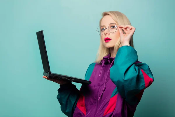 Style blonde woman in glasses with laptop computer — 스톡 사진