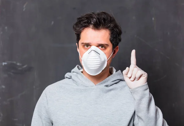 Style man in face mask on dark background
