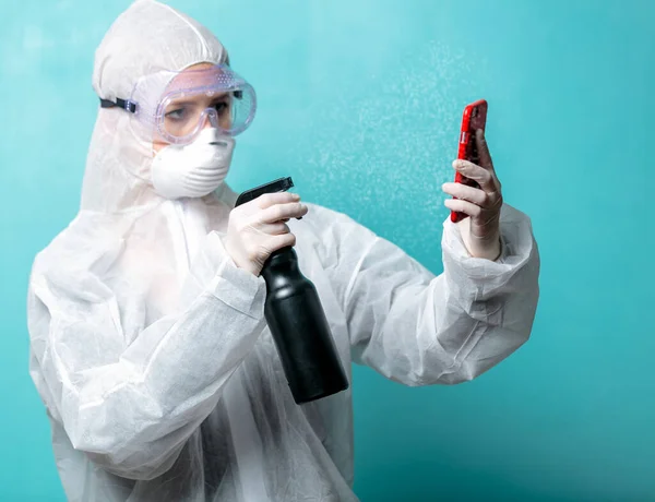 Medic Protection Clothes Sterilizes Mobile Phone Blue Background — Stock Photo, Image