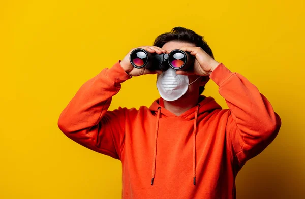 Guy Face Mask Looking Binoculars Yellow Background — Stock Photo, Image