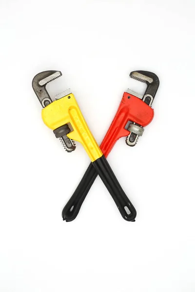 two crossed wrenches