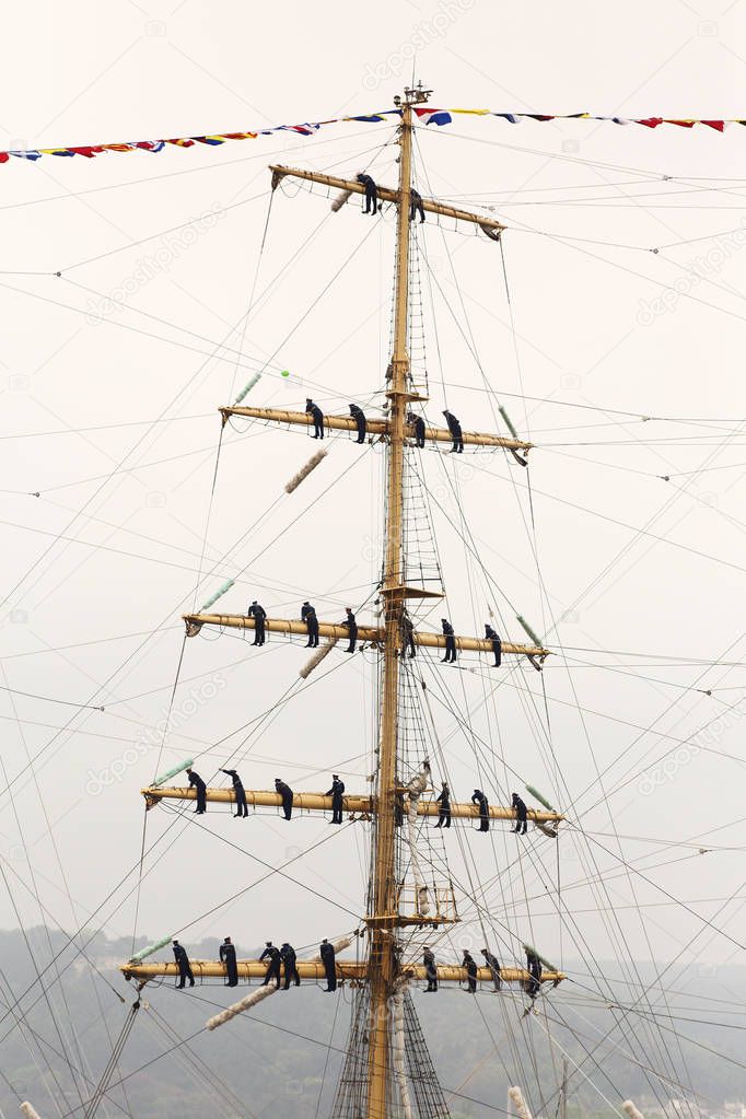 sailors on the masts