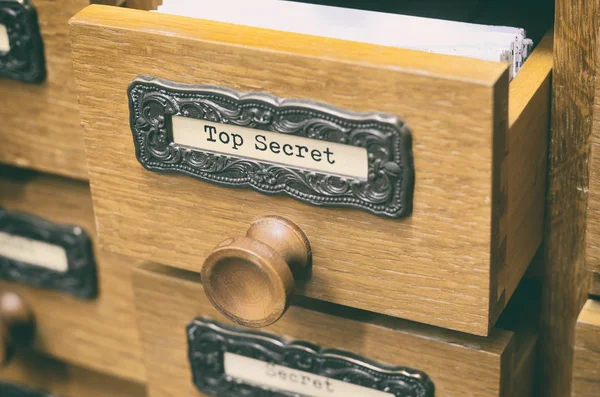 Old wooden archive files catalog drawer, top secret files