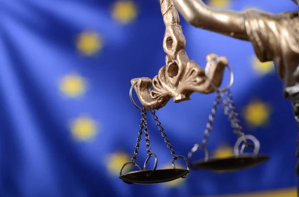 Scales of Justice, Justitia, Lady Justice in front of the European Union flag. — Stock Photo, Image