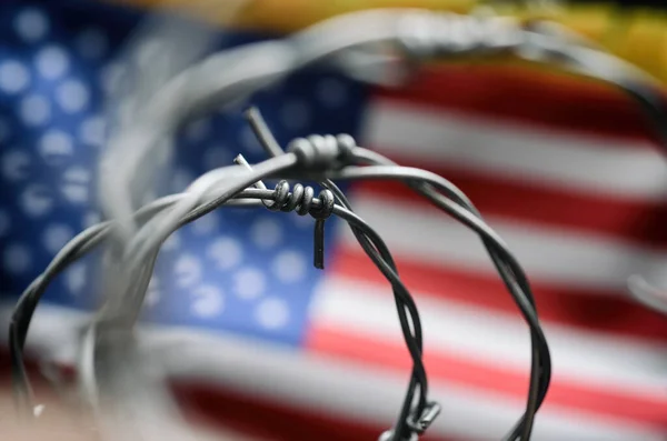 Barbed wire and United States of America flag , immigration stock concept — Stock Photo, Image