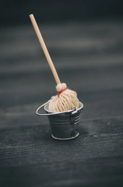 Metal bucket and mop, bucket and broom, cleaning concept.