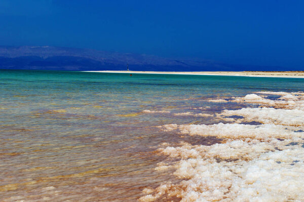 Dead Sea of salt on coast 