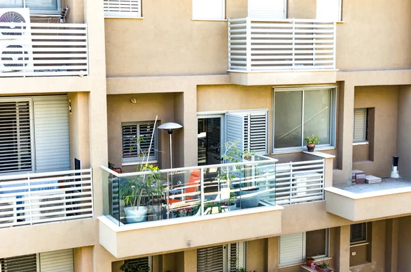 Glass balconies in an apartment building — Stock Photo, Image