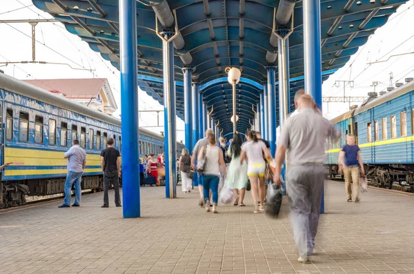 large number of people at the train station