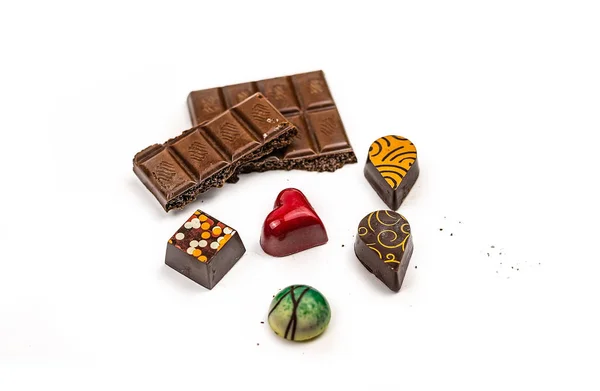 Colorful designer chocolates with a stuffing