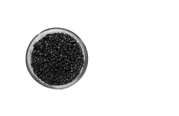 Caviar negro en un frasco — Foto de Stock