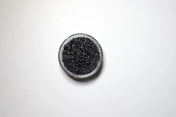 Black caviar in the can — Stock Photo, Image