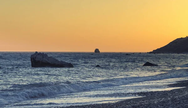 Petra tou Romiou, Kıbrıs, Baf bölgesi yakınındaki günbatımı