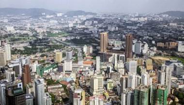 Kuala Lumpur, Malezya - 18 Mayıs 2013; Kuala Lumpur ve çevresinde kentsel Malezya en ekonomik olarak büyüyen bir bölge oluşturur. Onun modern manzarası Petronas ikiz kuleleri tarafından hakimdir.