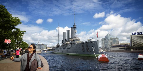 JUNE 28, 2017: Cruiser Aurora on her mooring place in front of t