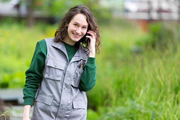 Attractive woman with phone — Stock Photo, Image