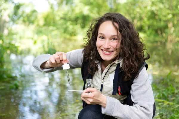Biologist woman working on water — Stock Photo, Image