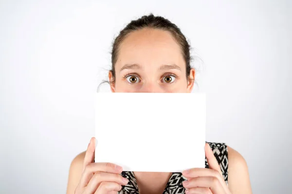 Woman hidden behind empty board — Stock Photo, Image