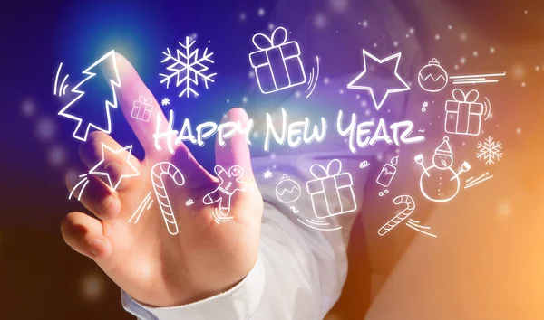 Main d'un homme touchant interface avec heureuse icône de nouvelle année autour — Photo