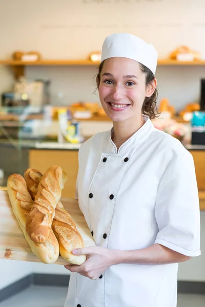 Baker working at the bakery — Stock Photo, Image