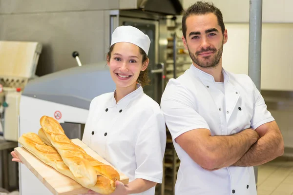 Bakers working at the bakery — Stock Photo, Image