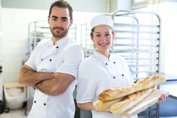 Bakers working at the bakery — Stock Photo, Image