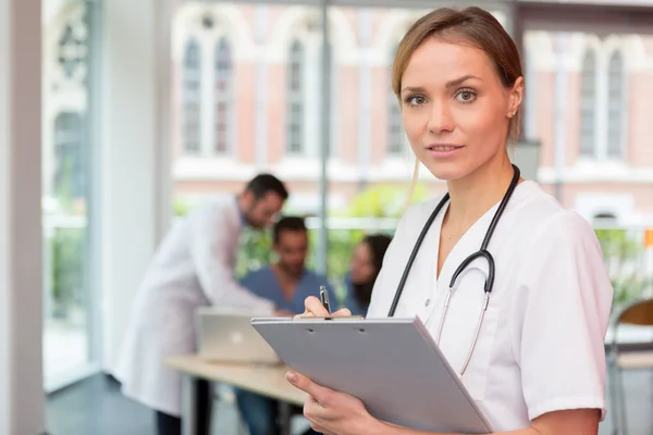 Young attractive nurse at the hospital — Stock Photo, Image