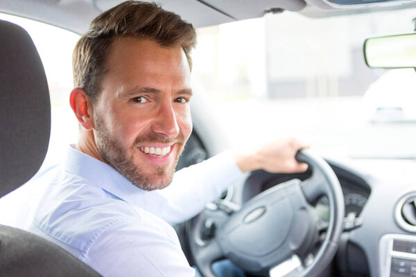  man driving his car