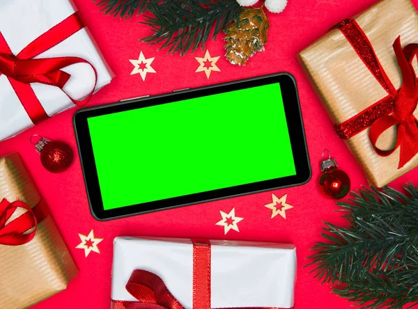 Smartphone in a Christmas decor — Stock Photo, Image
