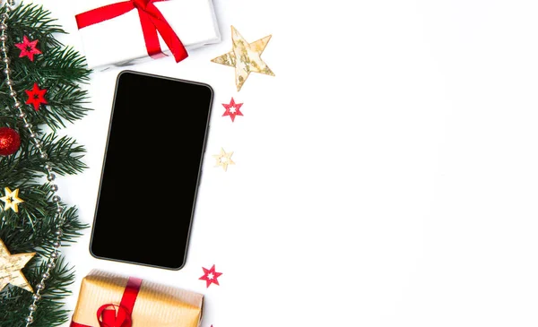 Smartphone a vánoční výzdoba — Stock fotografie