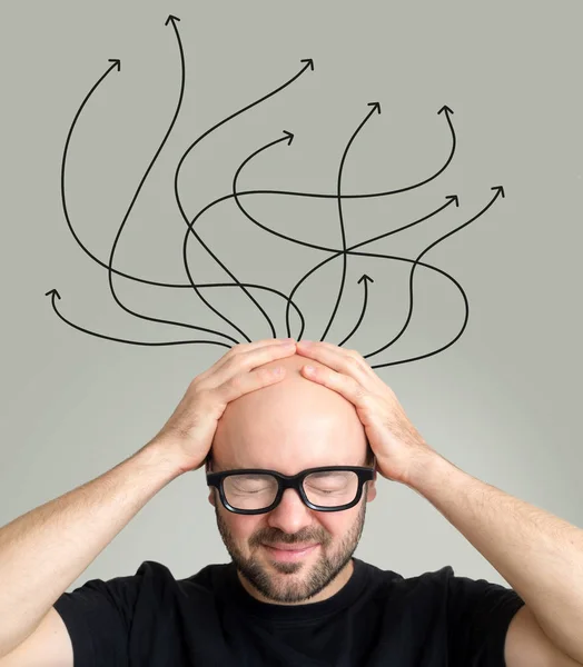 Arrows going out of the head of man — Stock Photo, Image