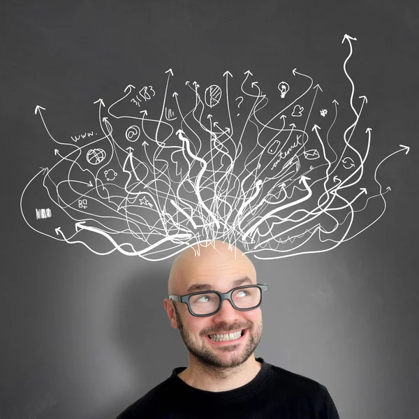 Man with brainstorming arrows over head Stock Picture
