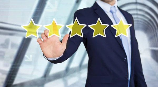Businessman touching interface with ranking stars